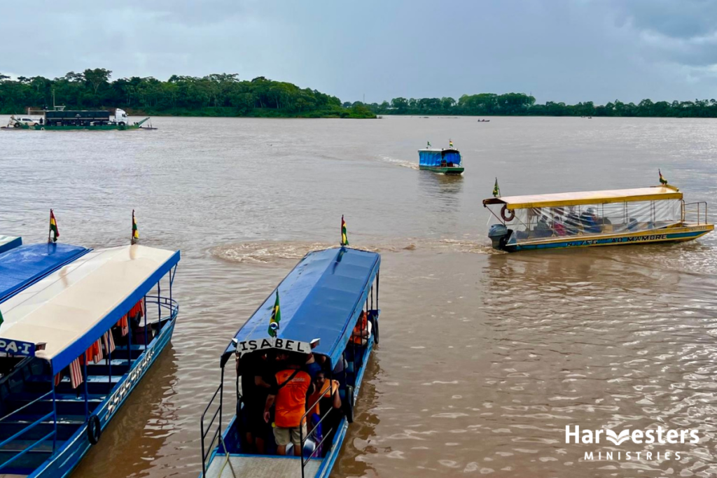 Boats on river. Harvesters Ministries